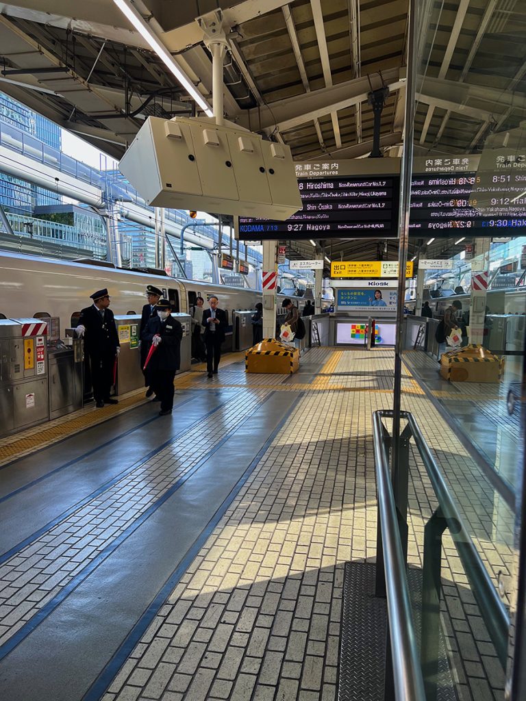 Image of Shinkansen station in Japan featured on a blog about Japan travel mistakes.